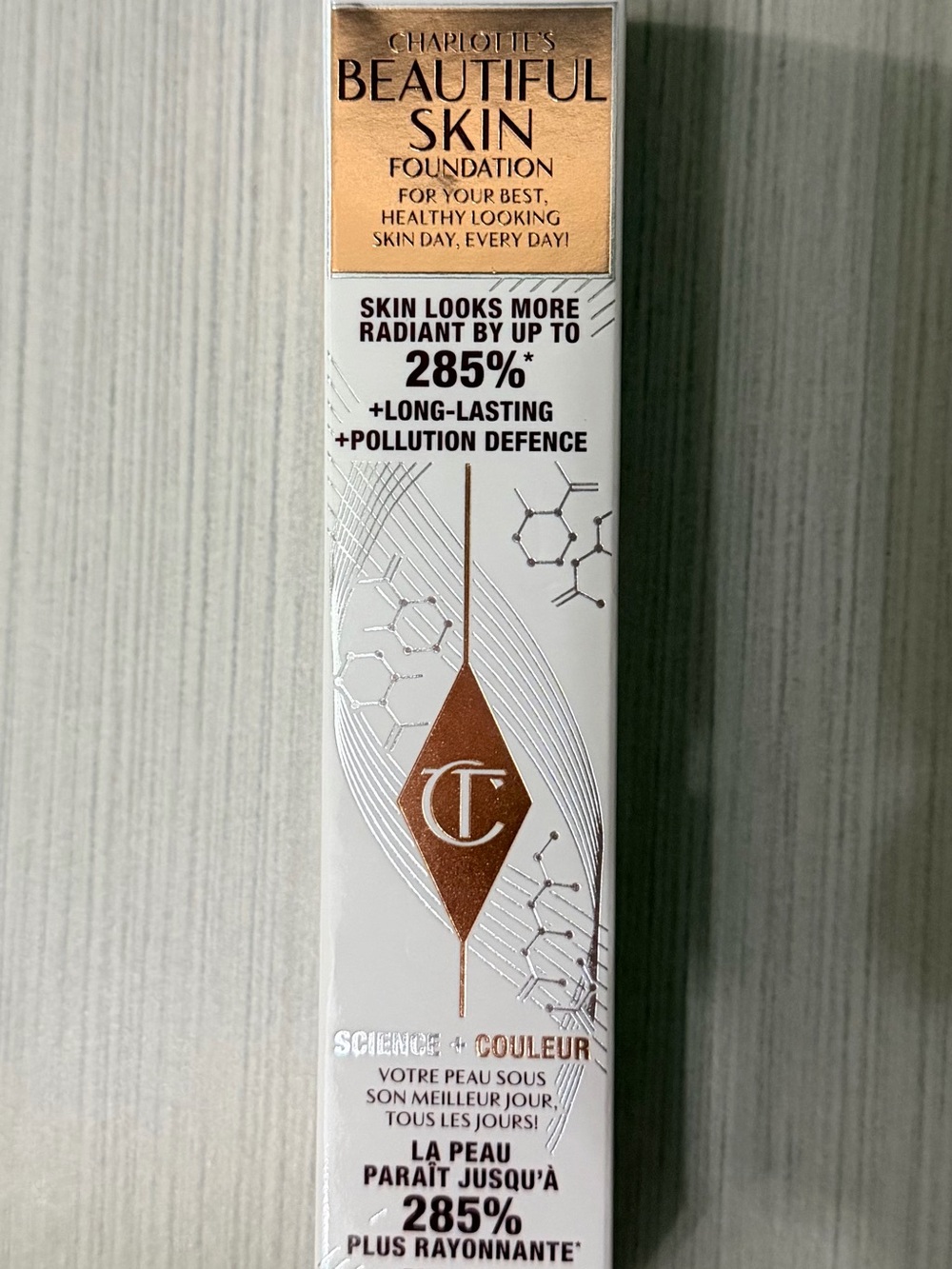 Charlotte Tilbury Beautiful Skin Foundation - Rose Gold and White Packaging